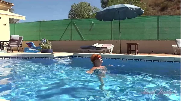 AuntJudys - Busty Mature Redhead Melanie goes for a swim