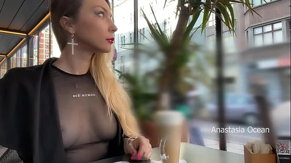 Flashing tits in cafe with glass walls so all people outside see me. Transparent t-shirt no bra.