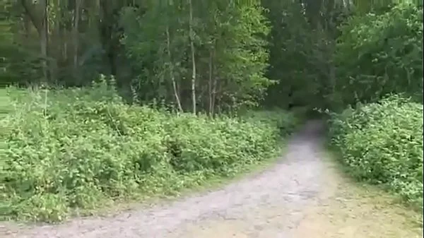 Young guy fucks an adult lady with beautiful boobs right in the forest