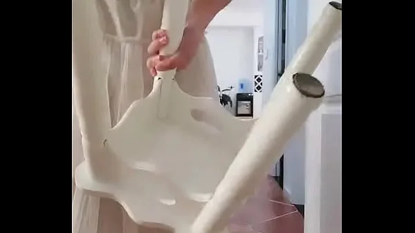 Chinese girl using chair legs as dildo