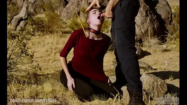 Petite, hardcore submissive masochist Brooke Johnson drinks piss, gets a hard caning, and get a severe facesitting rimjob session on the desert rocks of Joshua Tree in this Domthenation documentary