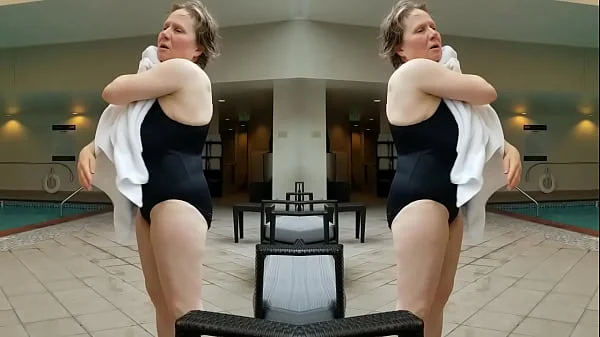 Sexy Grandma is Sexy at 66 in a black swimsuit